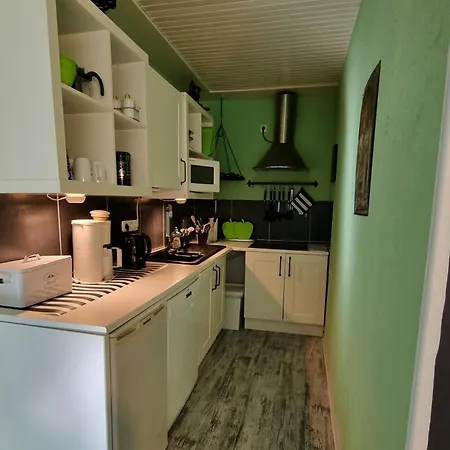 Kaptain's Kombuese Apartamento