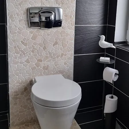Kaptain's Kombuese Apartamento *